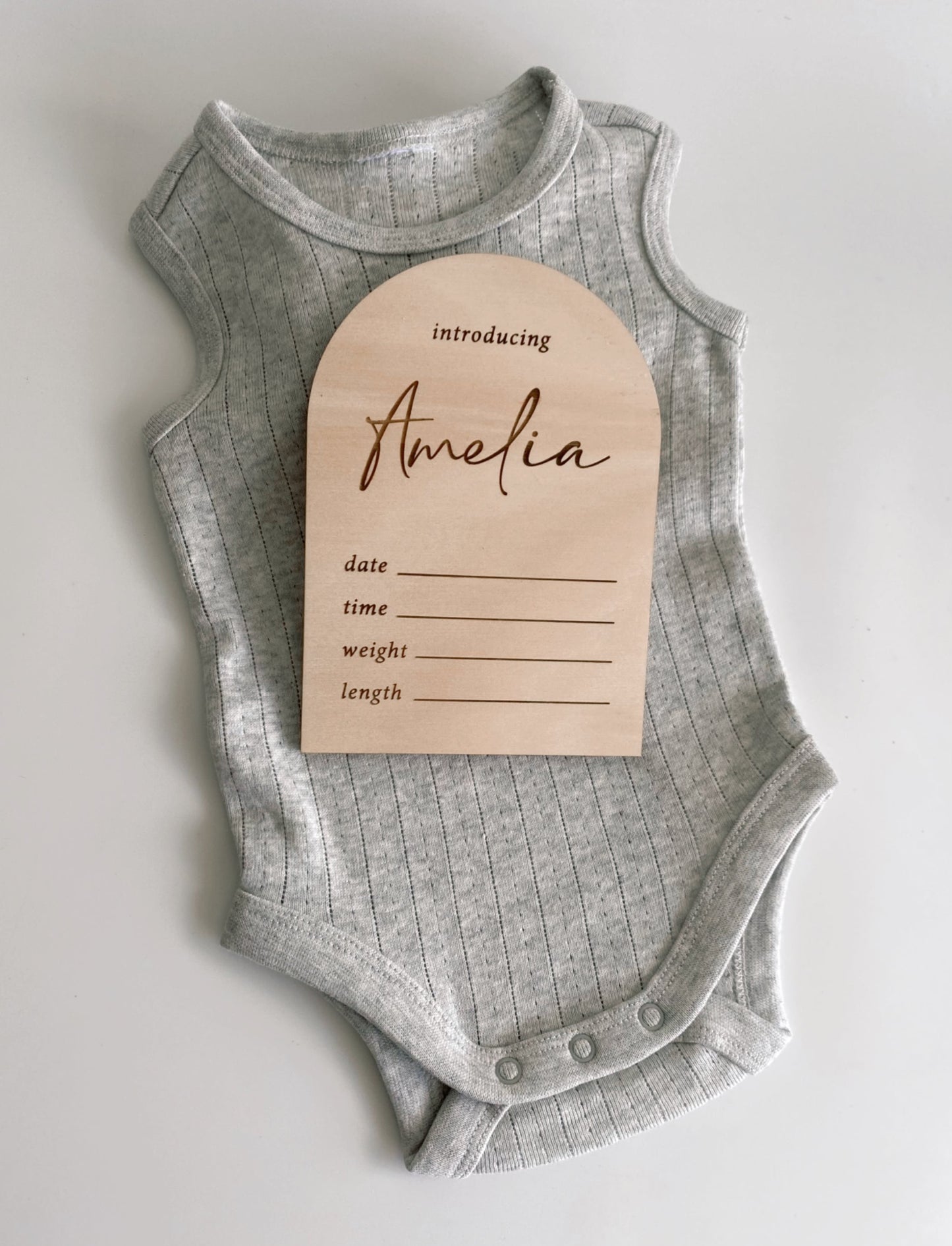 'introducing' birth announcement arch
