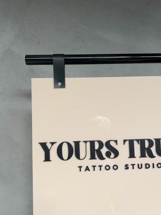 Hanging signage. Pole + acrylic sign